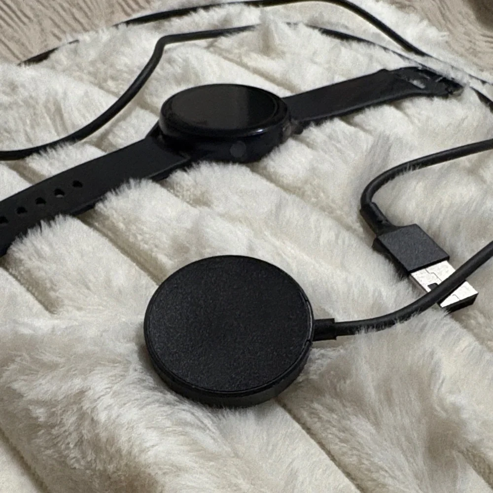 Samsung Black Smartwatch with Charging Cable